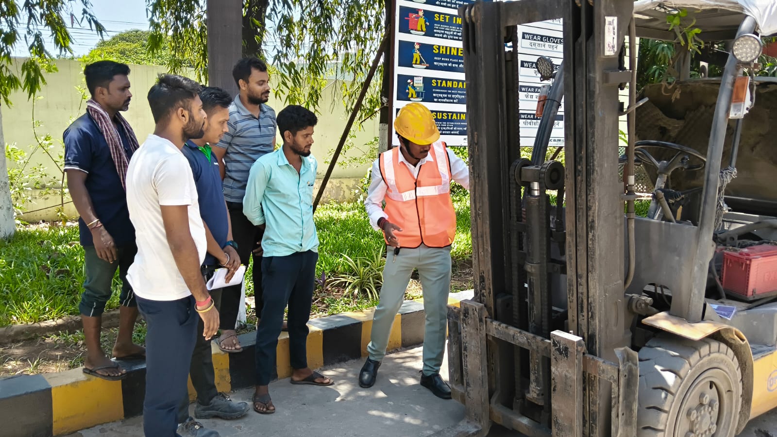 Students learning safe forklift procedures